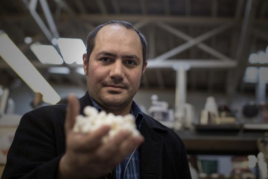 Anthony Di Franco holds a 3-D printed model of an insulin molecule at Counter Culture Labs in Oakland. 